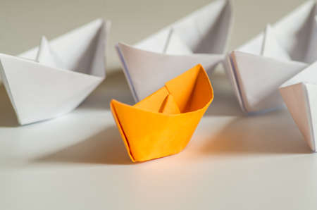 leadership concept. paper ships follow the leader origami shipの写真素材