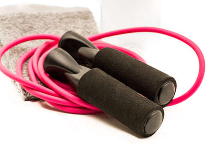 jump rope and towel isolated on white background
