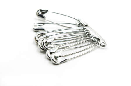 metal straight pin on the white backgroundの写真素材