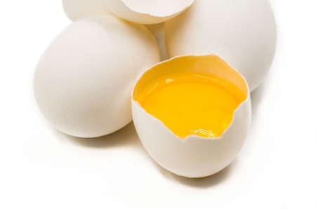 fresh eggs with yellow yalk on the black backgroundの写真素材