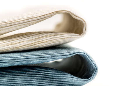 two linen texture background table cloth on whiteの写真素材