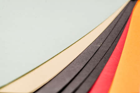 colorful paper clips on the white backgroundの写真素材