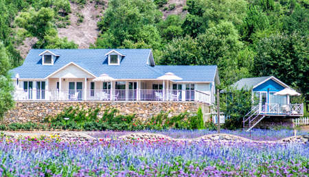 summer houses in a beautiful mountain landscapeの写真素材