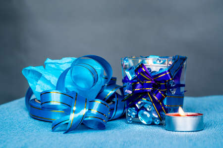 Christmas composition with candle. hand made christmas paper and stickers candle craftの写真素材
