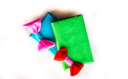 bright blue and green hand made gift boxes with nice crepe wrapping and bows. Happy holidays. christmas conceptの写真素材