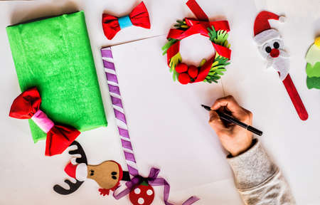 christmas concept. hand made to do list. creative christmas paper for letter,invitation or to do listの写真素材