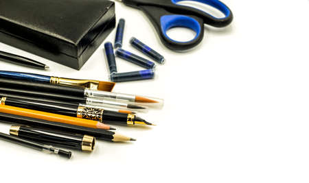 various stationary in black colors isolated on whiteの写真素材