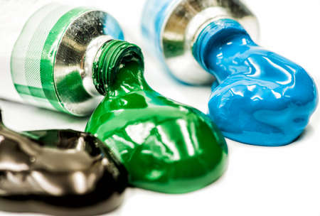 various colorful tubes with watercolor paintの写真素材