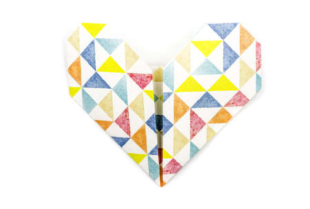 valentine's day concept. origami paper heart made of colorful paper isolated on white backgroundの写真素材