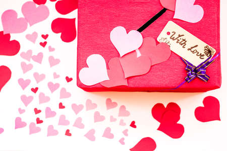 valentines day red gift box with a gap for paper valentinesの写真素材