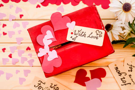 red box for paper hearts on wooden rustic background. valentines day conceptの写真素材