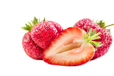 fresh juicy strawberries isolated on white backgroundの写真素材