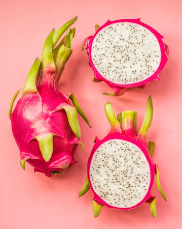 Creative layout made of pitahaya . Flat lay. Food concept. dragonfruit on pink background.の写真素材