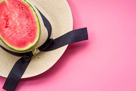 creative layout of fruit. a watermelon and oranges on blue and pink backgroundの写真素材
