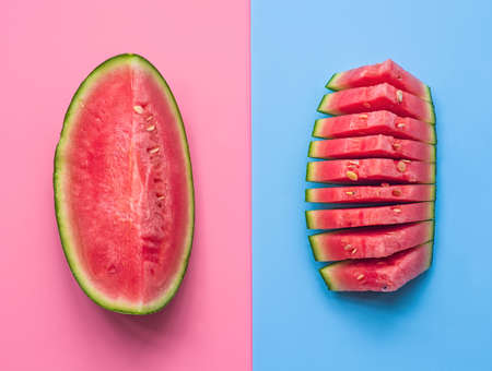 creative layout of fruit. watermelon slices ojnpink and blue backgroundの写真素材