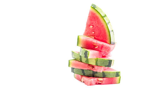 watermelon slices pile isolated on whiteの写真素材