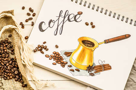 a bright hand-drawn sketch with jezve and coffee made with markers decorated with coffee beans on white wooden backgroundの写真素材