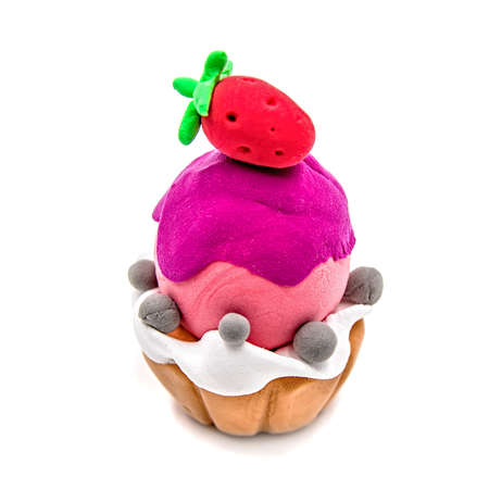 creative plasticine cupcake craft isolated on white. hand made fake clay craftの写真素材
