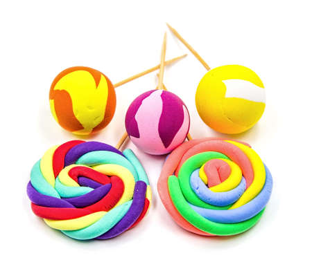 creative hand made plasticine lollipop crafts isolatedon white backgroundの写真素材