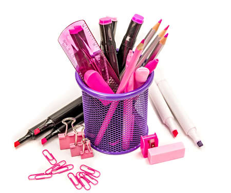 pink and purple stationery in a holder, school or office supplies isolated on whiteの写真素材