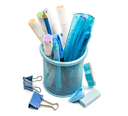 back to school concept. blue stationery in a metal pen container isolated on white backgroundの写真素材