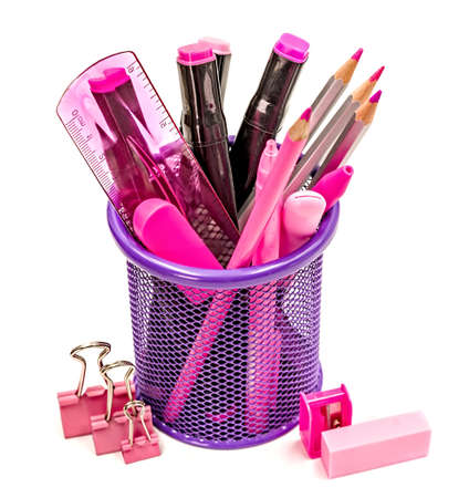 back to school concept. purple and pink stationery in a metal pen container isolated on white backgroundの写真素材