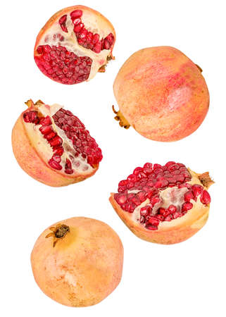 pomegranate flying isolated on white backgroundの写真素材