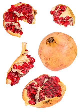 pomegranate pieces flying isolated on white backgroundの写真素材