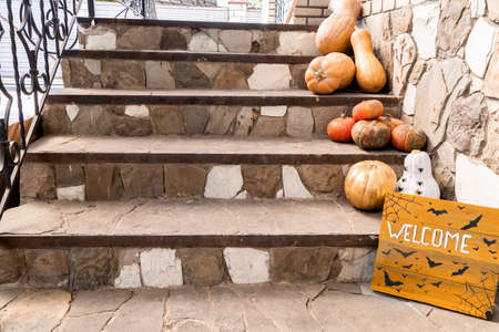 Halloween concept. Halloween pumpkins and decorations on doorstepsの写真素材