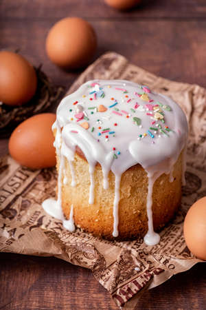Easter holiday concept. Easter Cake with eggs on wooden background