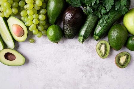 Healthy food concept. Fresh organic green vegetables top view with copy space