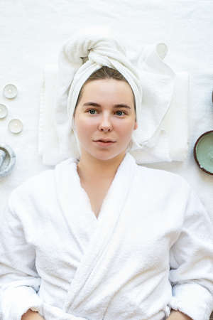 Spa and wellness. Natural cosmetics. Self care. Top view of a relaxed woman having spa procedures...
