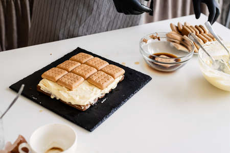 Cooking a homemade tiramisu cake high angle view