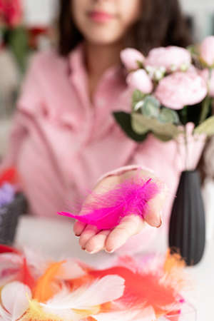 beautiful woman greeting her friends online, celebrating easterの写真素材