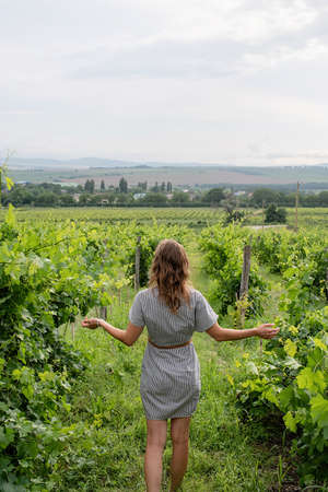 Young woman enjoying nature outdoors in summertime
