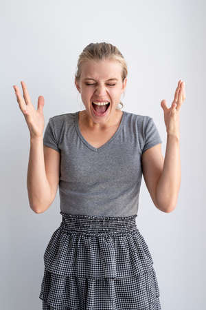 fitness, home and diet concept. Smiling young woman stretching at home, in the kitchen