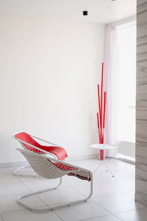Interior design. Minimal modern design of Living room with red chairs and windowの写真素材