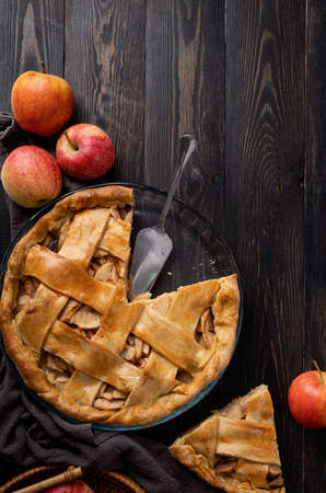Top view of homemade apple pie on black wooden tableの写真素材