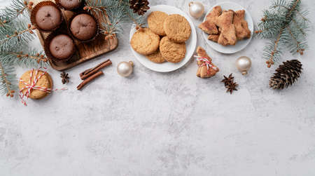 top view christmas cookies, muffins and gingerbread flay lay with copy spaceの写真素材