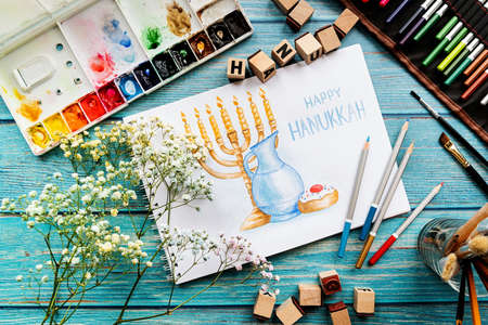 Top view of a watercolor art Happy Hanukkah, watercolor art, flat layの写真素材
