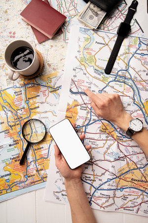 woman hand drawing on travel map, planning trip or vacation. Top view travel or vacation concept