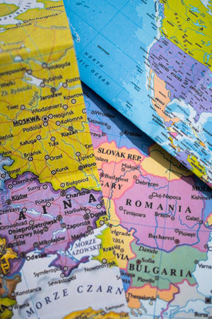 travel concept. pile of maps of europe and usa, clusterup