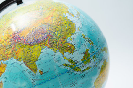 travel concept. closeup of a globe on white backgroundの写真素材