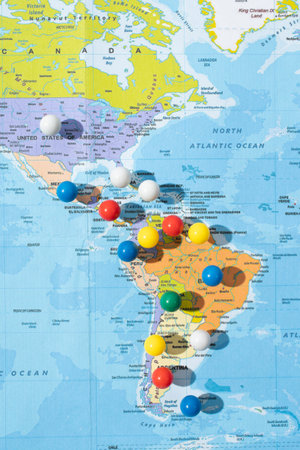 the world Map, various locations with pins, push pin on map closeup