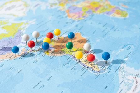 the world Map, various locations with pins, push pin on map closeup
