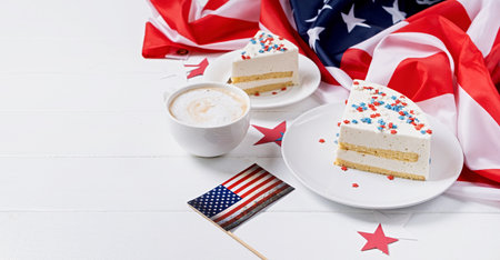 Fourth of july celebration. Sweet cake with usa flag colored sprinkles and stars , flag backgroundの写真素材