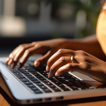 Close-up of female hands typing on laptop keyboard indoors. Businessman working in office or student browsing information, AI Generatedの素材