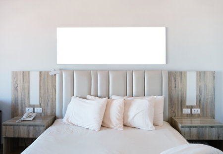 Hotel room Interior with blank white frame for mockup designの写真素材