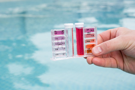 PH and chlorine analysis kit for swimming pools. Liquid chlorine and PH meter for swimming pools. Liquid reagent for pool maintenance. Analysis system for water quality and quantity of PH and Cl testの写真素材