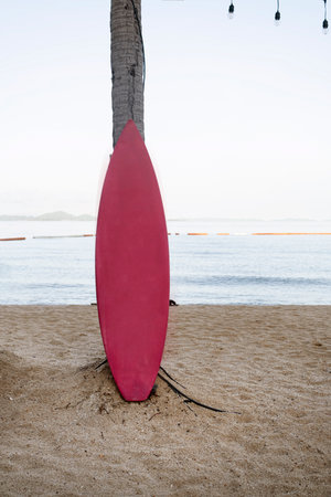 surf board on the sandy beach for mockup design